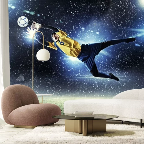 Papier peint  Un gardien de but attrapant un ballon