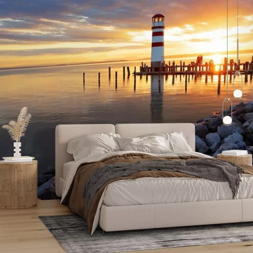 Papier peint  Phare près d'une plage de galets