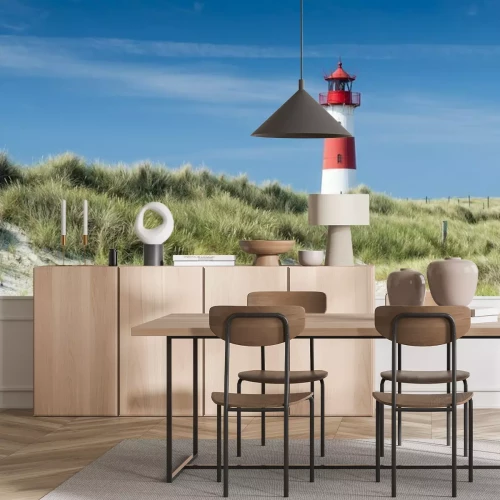 Papier peint  Un phare parmi les dunes et l'herbe