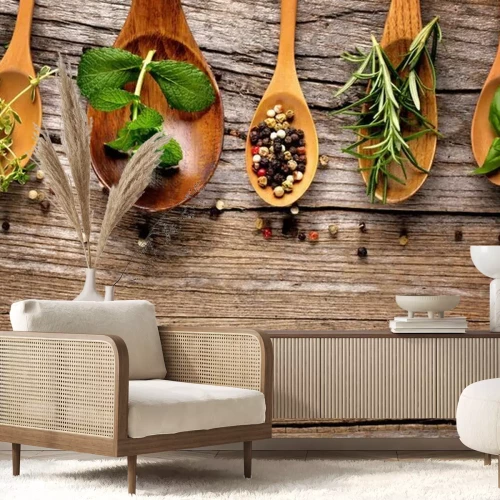 Papier peint  Diverses épices et herbes disposées sur des cuillères en bois
