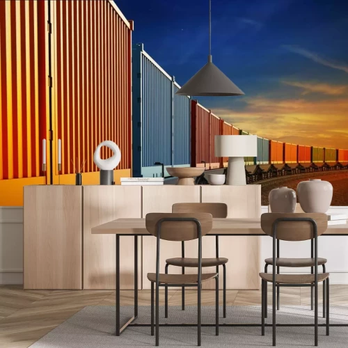 Papier peint  Wagons de train colorés contre le coucher du soleil