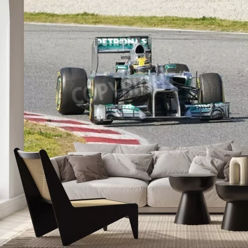 Papier peint  Une voiture de course de Formule 1 sur un circuit