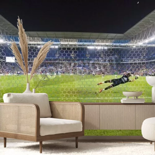 Papier peint  Gardien de but plongeant pour récupérer le ballon en défense