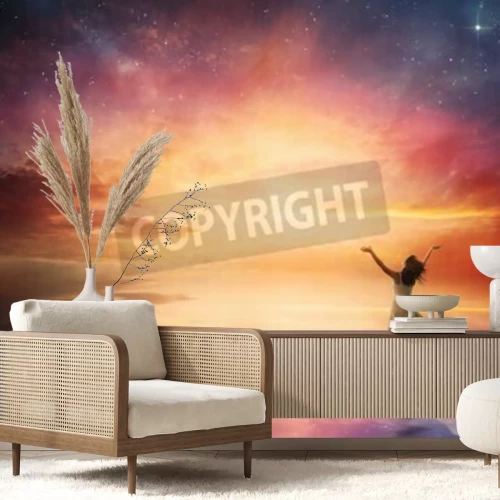 Papier peint  Lever de soleil avec des étoiles et une femme