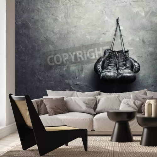 Papier peint  Gants de boxe sur un mur en béton