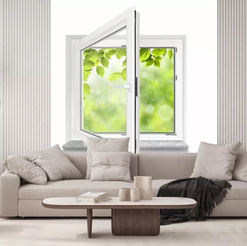 Papier peint  Une vue à travers une fenêtre blanche sur des feuilles