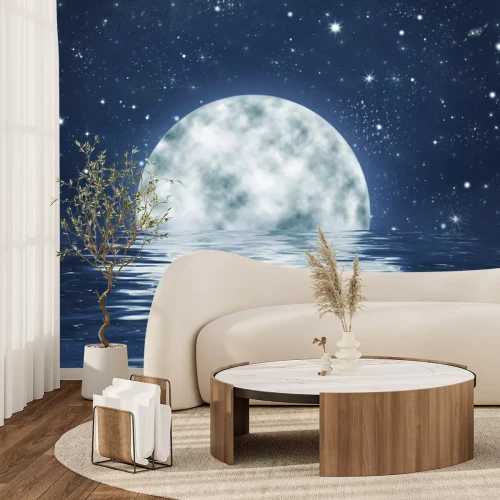 Papier peint  Lune sur un ciel étoilé se couchant derrière l'horizon