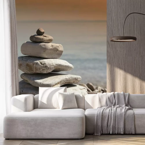 Sticker  Stack of stones, Zen concept, on sandy beach