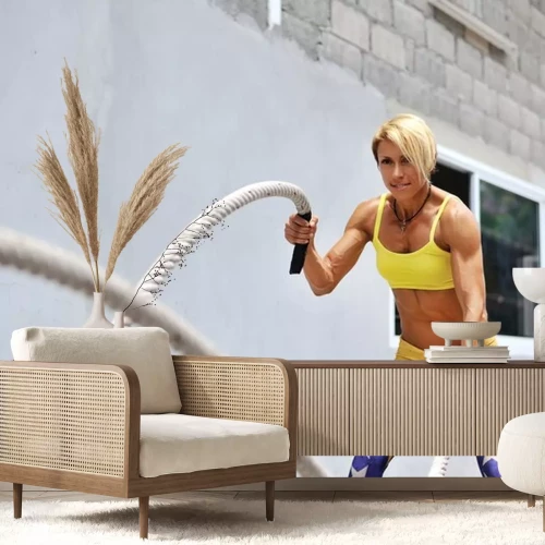 Sticker  Athletic jeune femme faisant quelques exercices crossfit avec une corde o