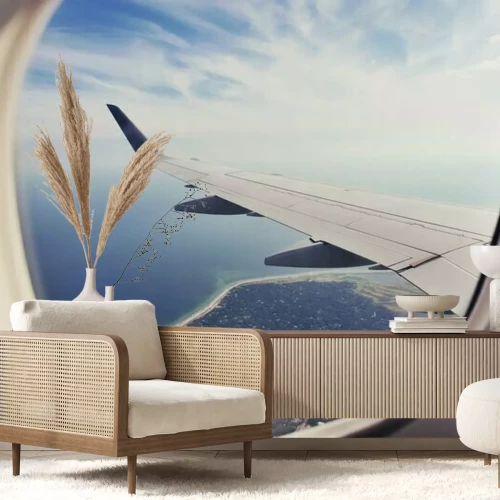 Papier peint  Hublot rond dans un avion