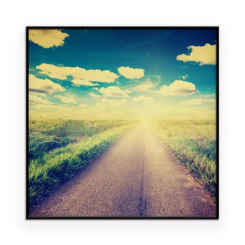 Poster  Une route de campagne traversant de vastes champs