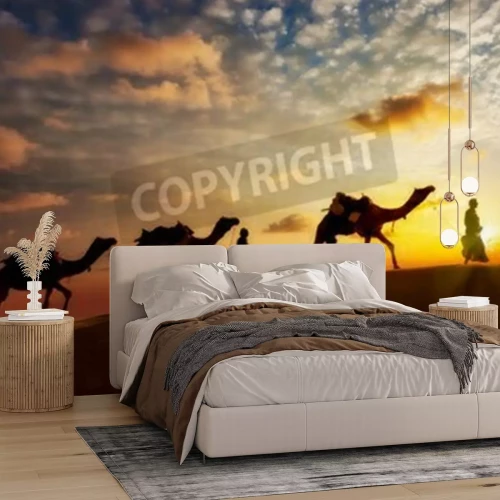 Papier peint  Silhouettes de personnes et de chameaux dans le désert