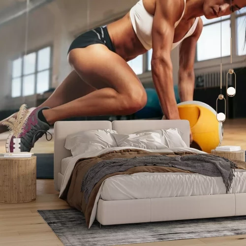 Papier peint  Femme sportive s'entraînant à la salle de sport