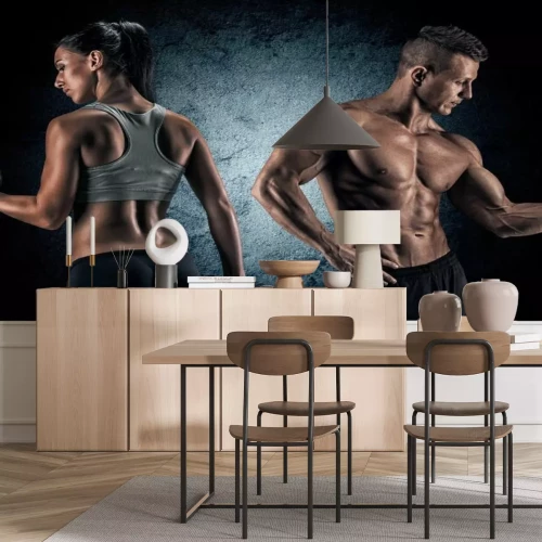 Papier peint  Femme et homme sportifs avec des poids