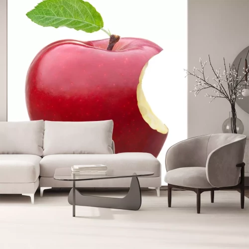 Sticker  Une pomme mordue sur un fond blanc