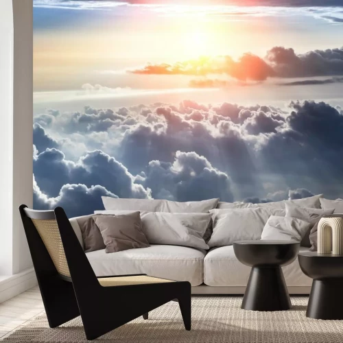 Papier peint  Rayons de soleil au-dessus des nuages