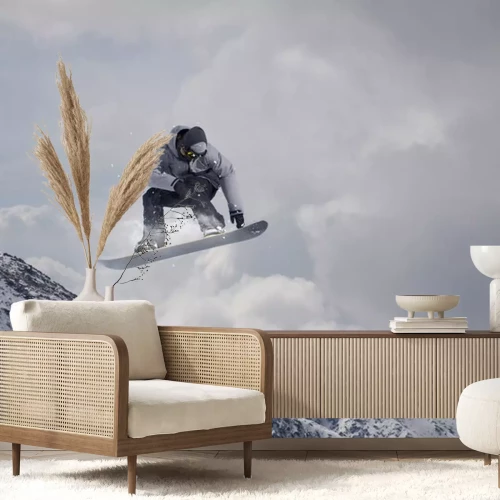 Sticker  Flying snowboarder sur les montagnes. Sport extrême.