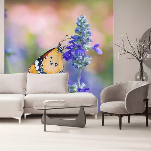 Sticker  Un papillon butinant