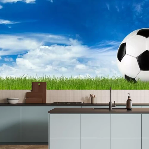 Papier peint  Ballon de football sur le terrain avec le ciel en arrière-plan