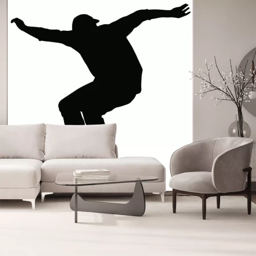 Sticker  Silhouette noire d'un garçon sur un skateboard