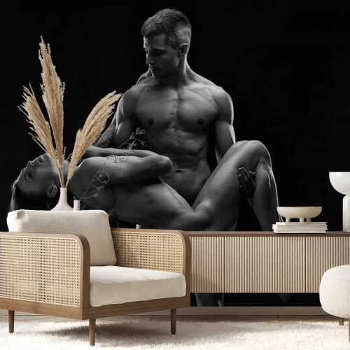 Papier peint  Nu d'un couple sportif sur fond noir