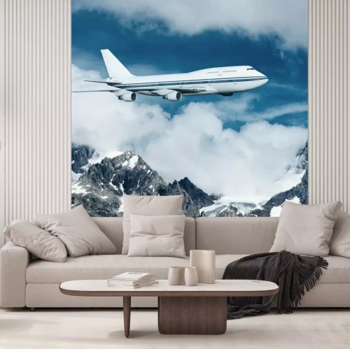 Papier peint  Avion de ligne survolant des montagnes enneigées