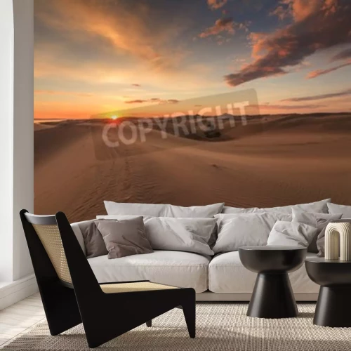 Papier peint  Le coucher de soleil dans le désert