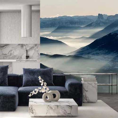 Sticker  Paysage avec des pics montagneux dans les nuages