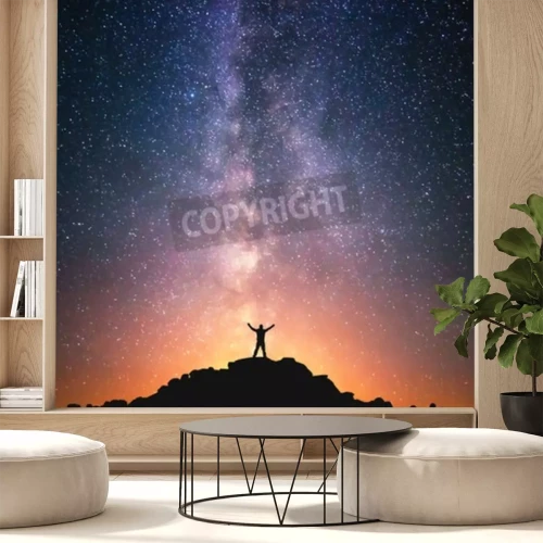 Papier peint  Un homme et un ciel étoilé