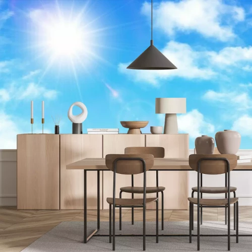 Papier peint  Un ciel bleu avec des nuages blancs et un soleil éclatant