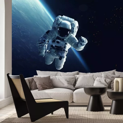 Sticker  Cosmonaute avec la Terre en arrière-plan