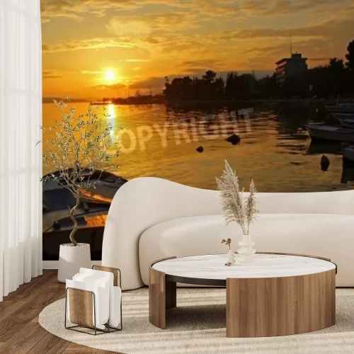 Papier peint  Coucher de soleil et un bateau