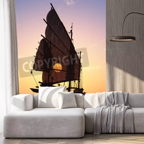 Papier peint  Vieux bateau avec des voiles sur fond coloré.