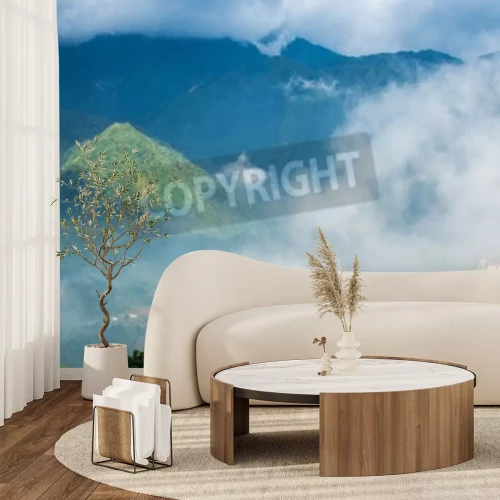 Papier peint  Des sommets de montagne dans les nuages