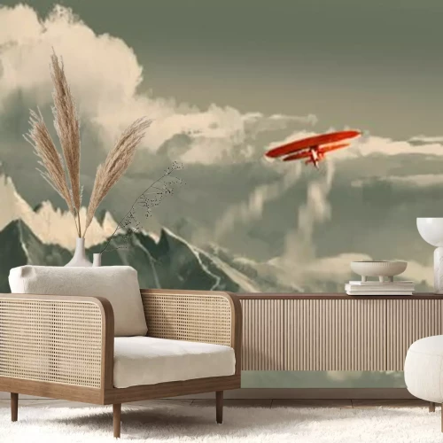 Papier peint  Biplan rouge sur fond de montagnes