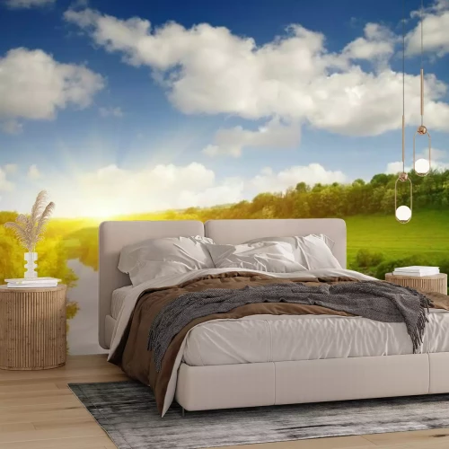 Papier peint  Coucher de soleil sur une clairière avec une rivière