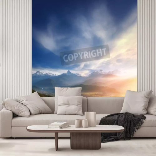 Papier peint  Lever de soleil sur une vallée de montagnes