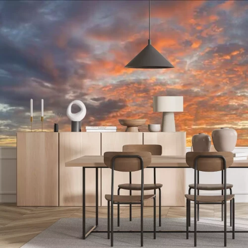 Papier peint  Coucher de soleil entre les nuages